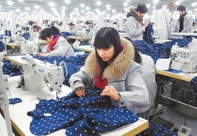 郭梅花 讓留守婦女家門口就業的服裝加工匠人